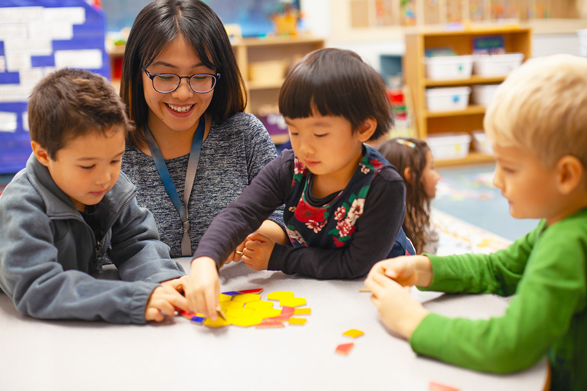 GettyImages-2170612428-b teacher with students