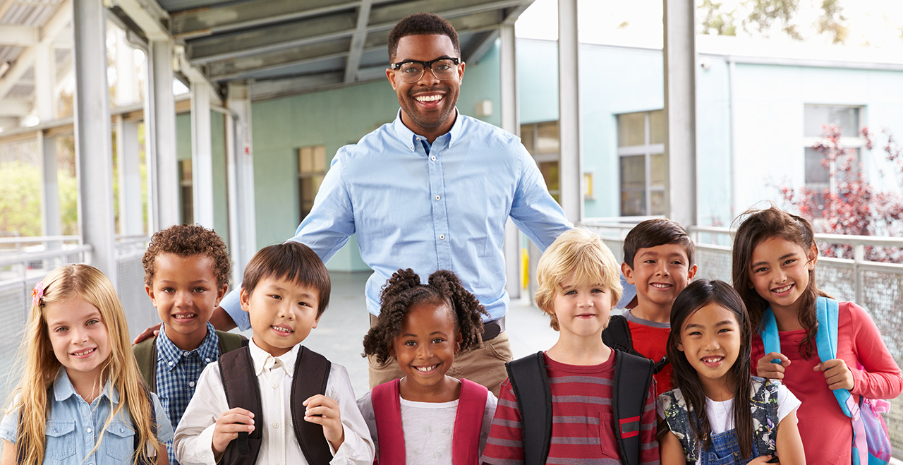 GettyImages-515273634-crop teacher with students